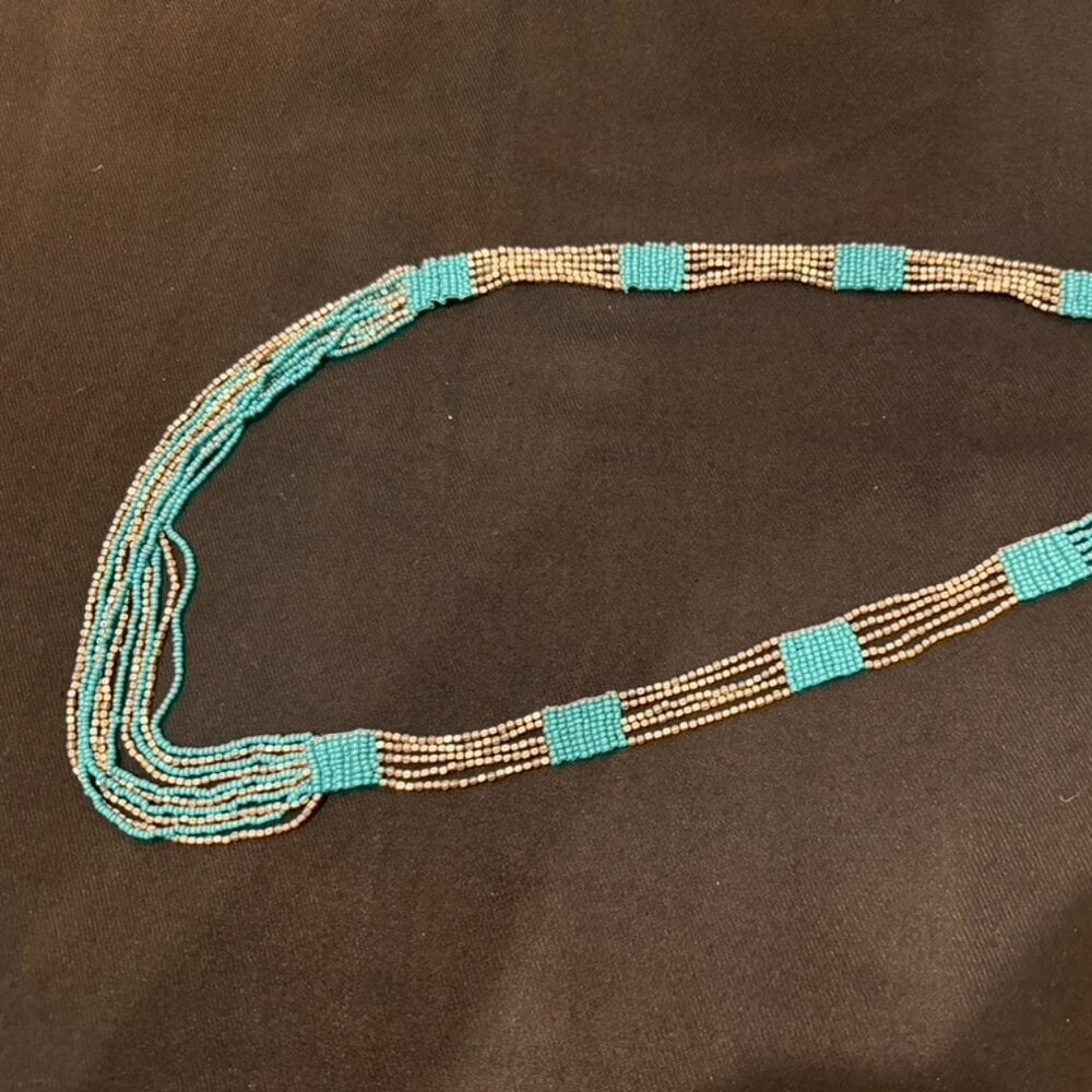 Multi-strand beaded turquoise and silver necklace